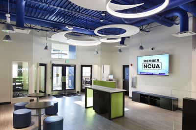 Credit union lobby with marketing monitors