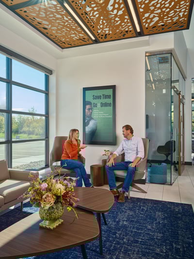 Credit union members socializing in the lounge
