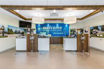Teller pods and marketing monitor