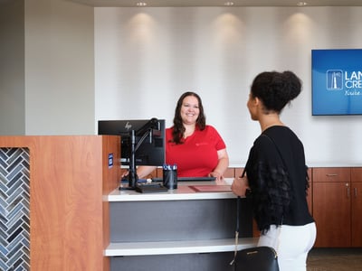 Friendly teller helping a member