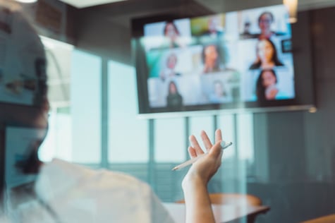 Virtual meeting in a board room