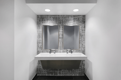 mosaic glass bathroom tile at Vibe Credit Union's new office