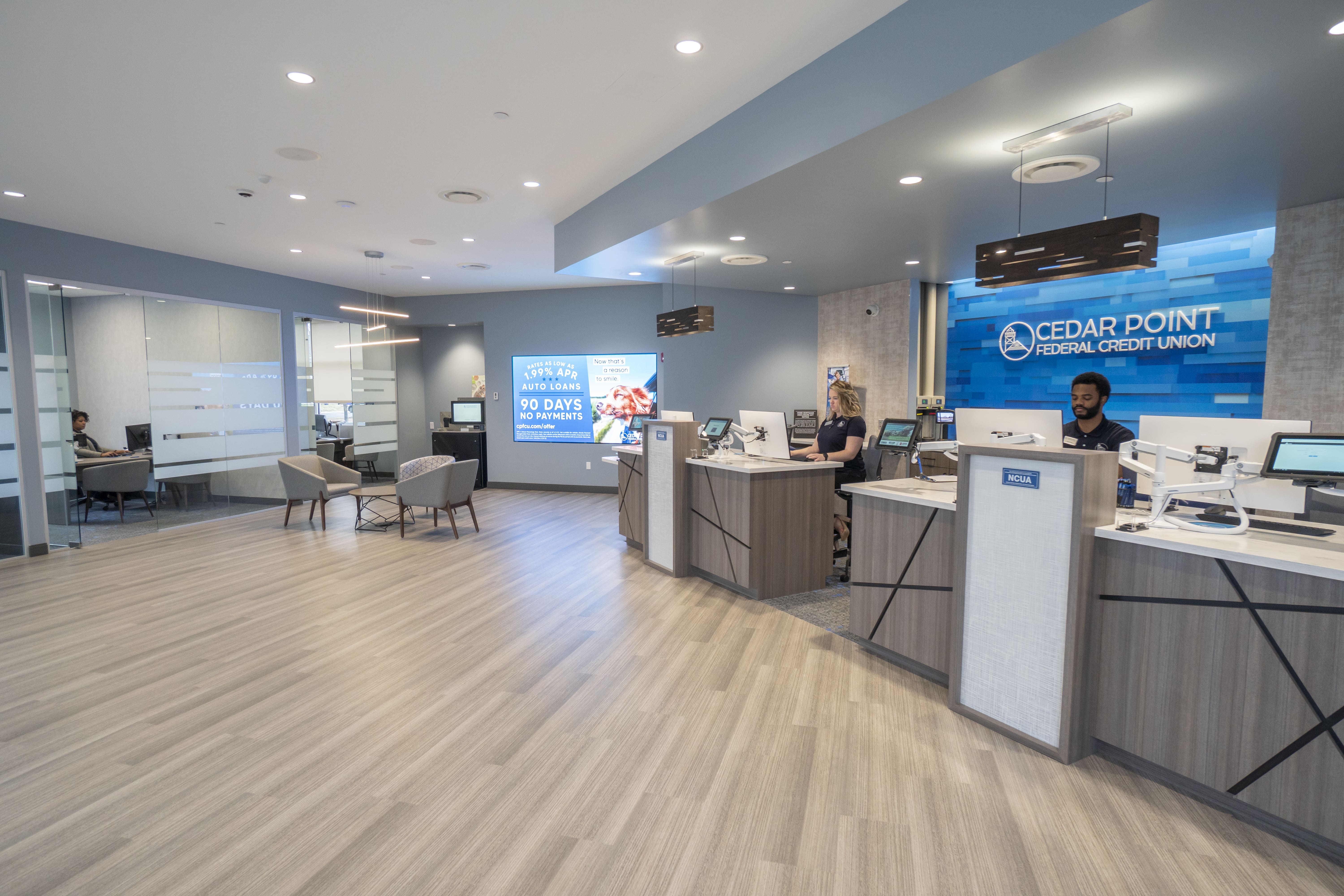 Modern credit union lobby with teller pods