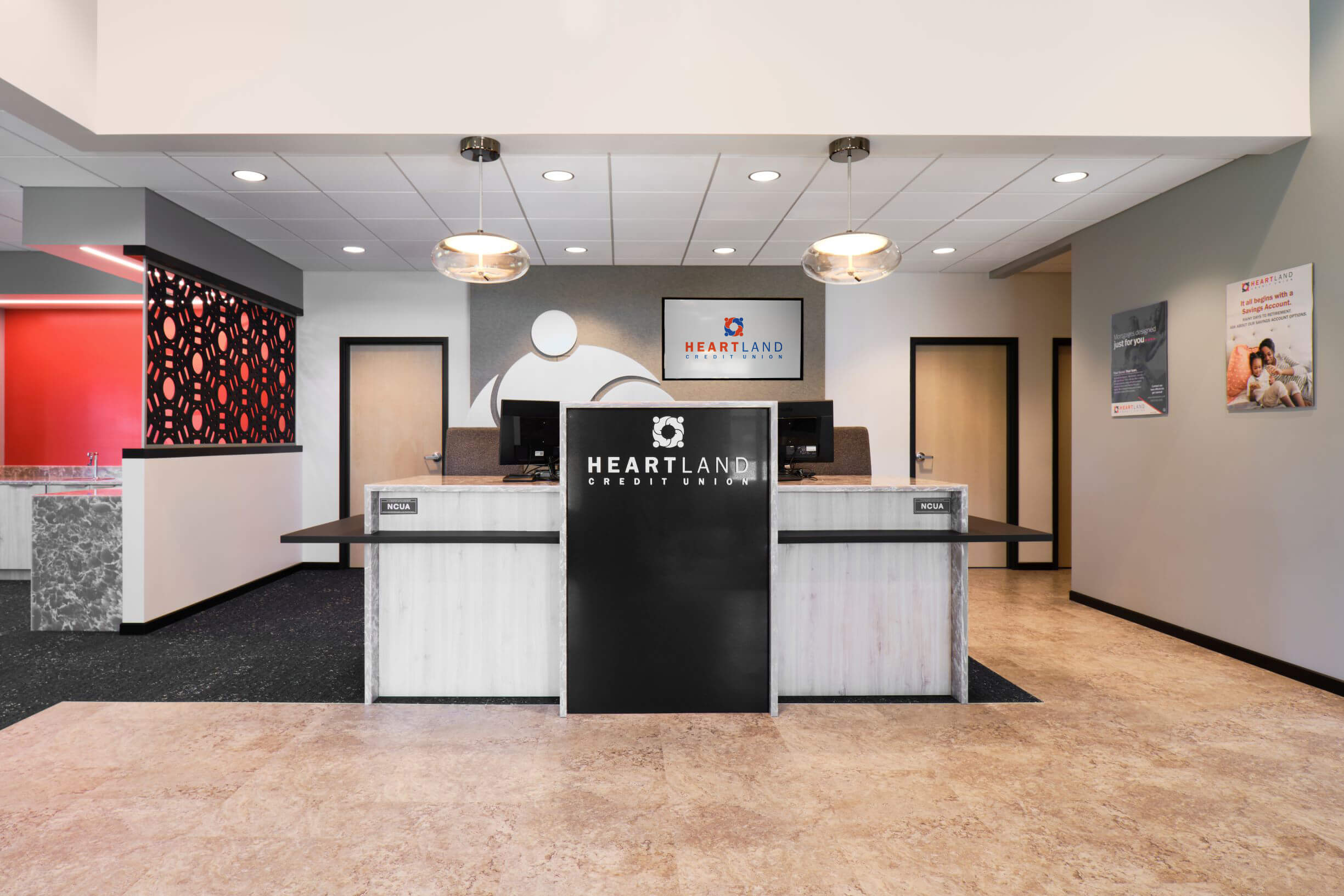 Teller pod and branded lobby display in a new credit union branch