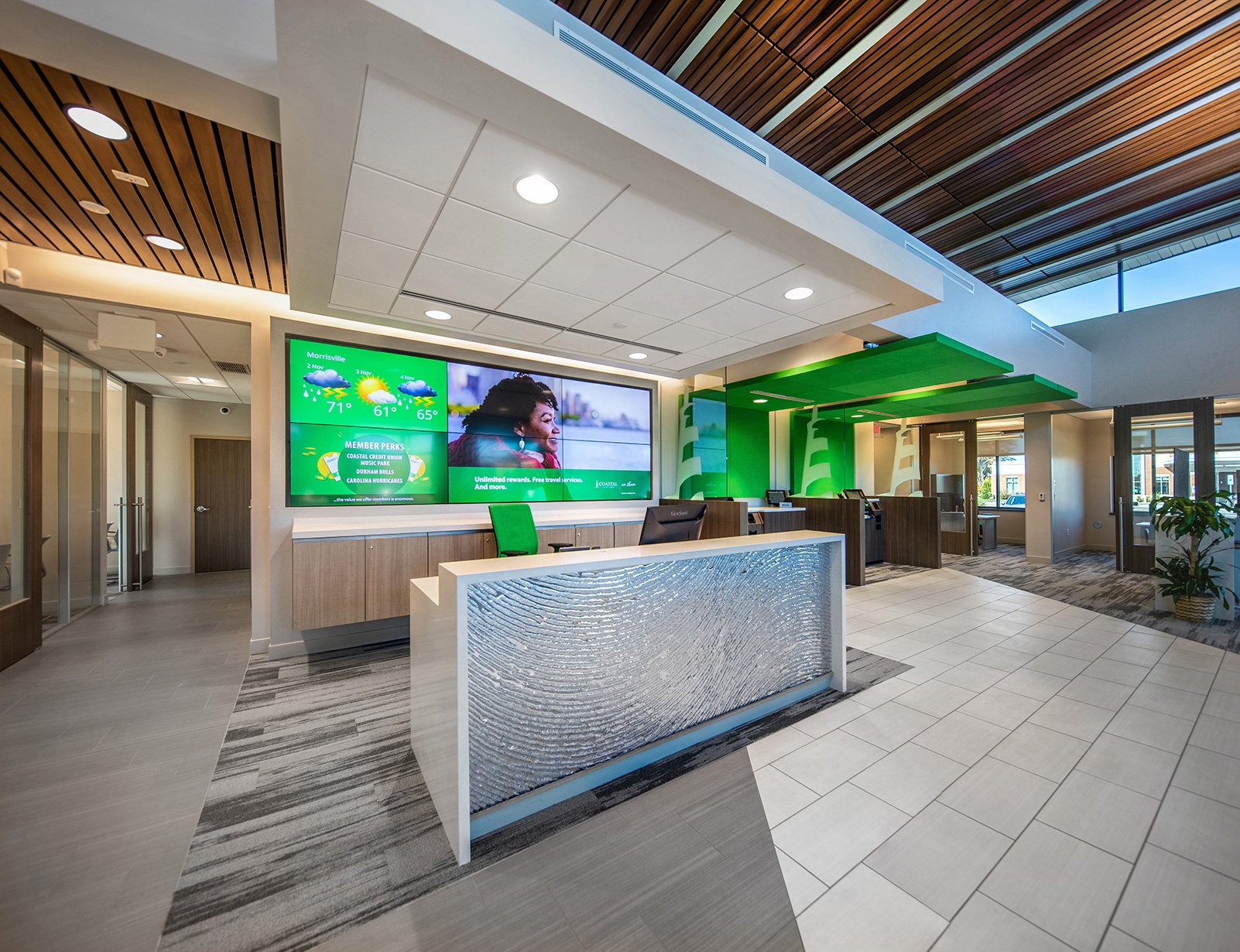 Welcome wall and reception desk and Coast Credit Union