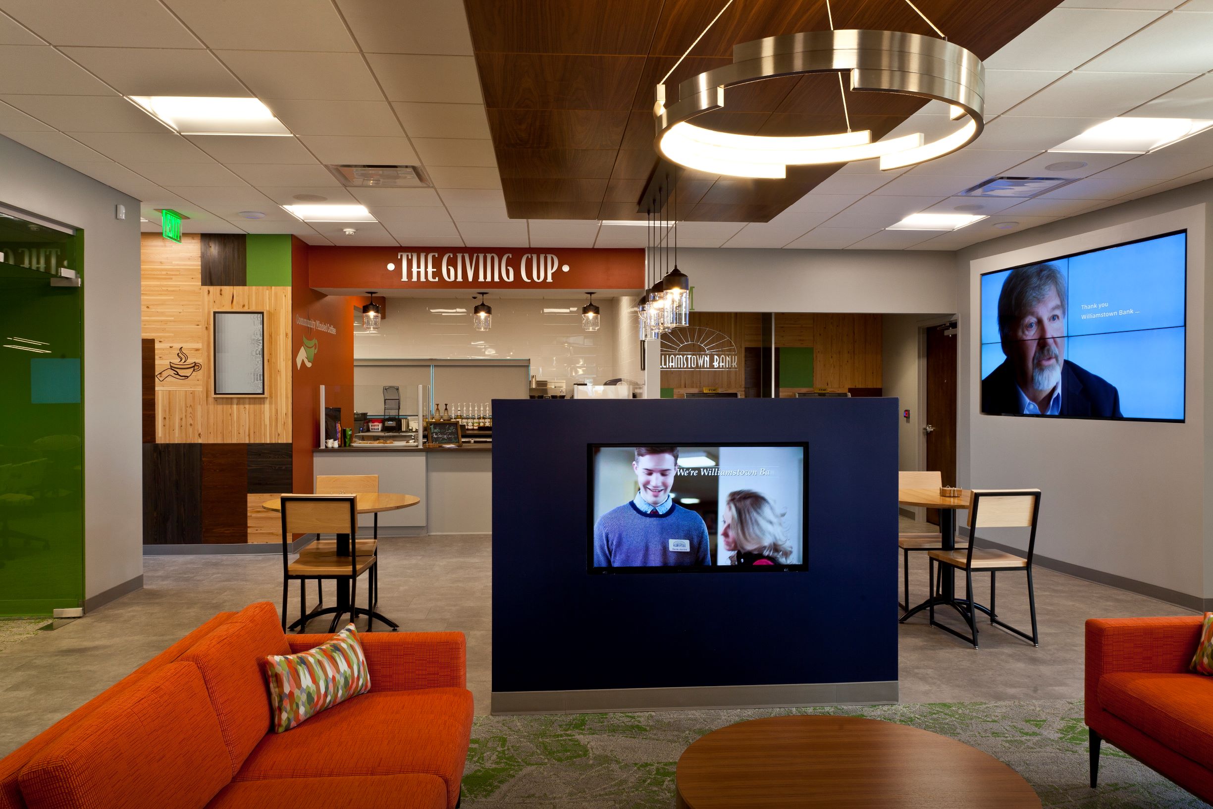Customer lounge filled with technology at Williamstown Bank